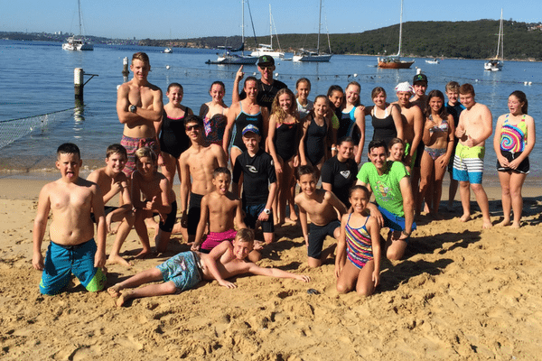 motiv8sports coaches and kids at the beach
